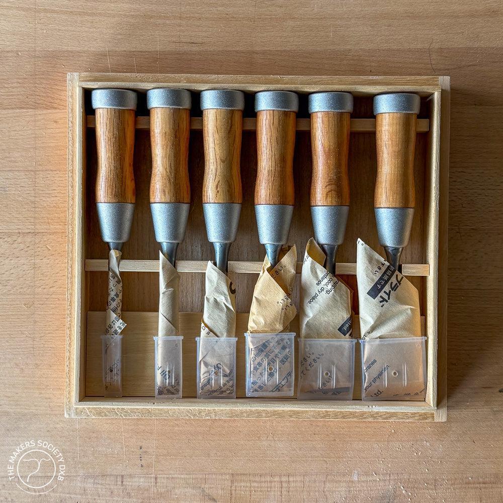Set of six highest grade Damascus steel wood chisels with wooden handles in a wooden box