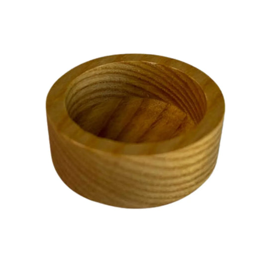 Round ash wood candle holder with smooth finish and visible wood grain