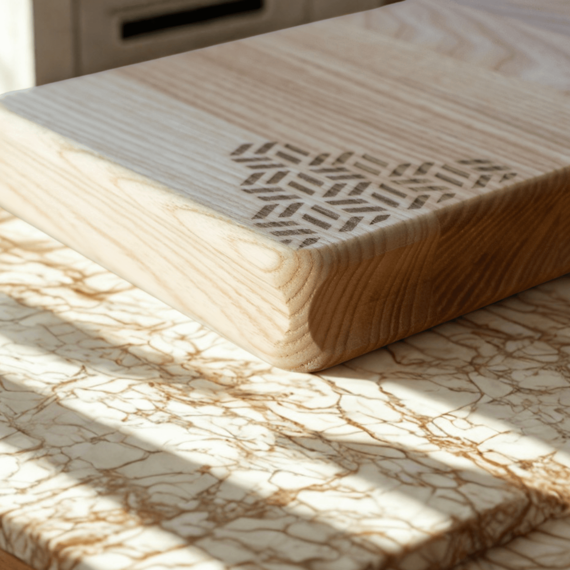 Detailed angled view of Tessera serving board with elegant shallow side handles, ideal for serving cheese or appetizer, with an elegant Kumiko inspired laser engrave, produced and sold by The Makers Society Dubai.