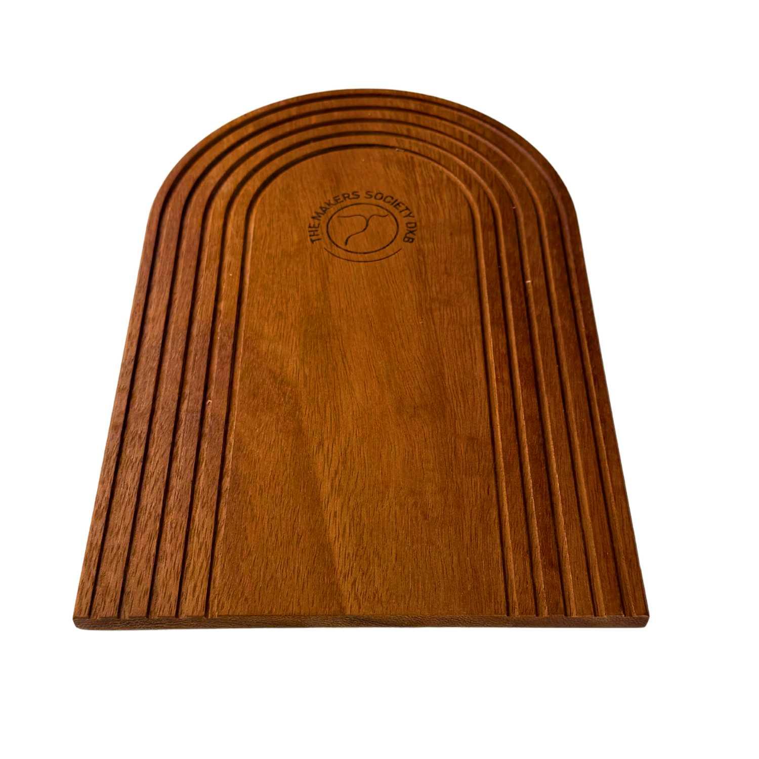 Wooden grooved tray with arched design and The Makers Society logo in center