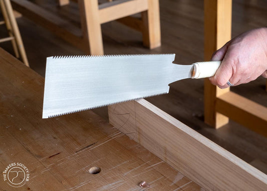 Kakuri Ryoba Saw – 240mm Japanese Double-Edge Saw in action cutting wood sold by The Makers Society Dubai