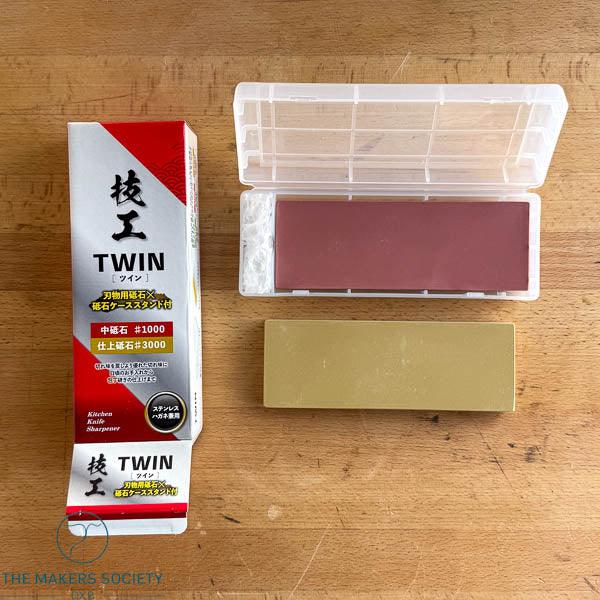 Kakuri Gikoh twin whetstone #1000 and #3000 with dual sharpening stones and protective case on workbench