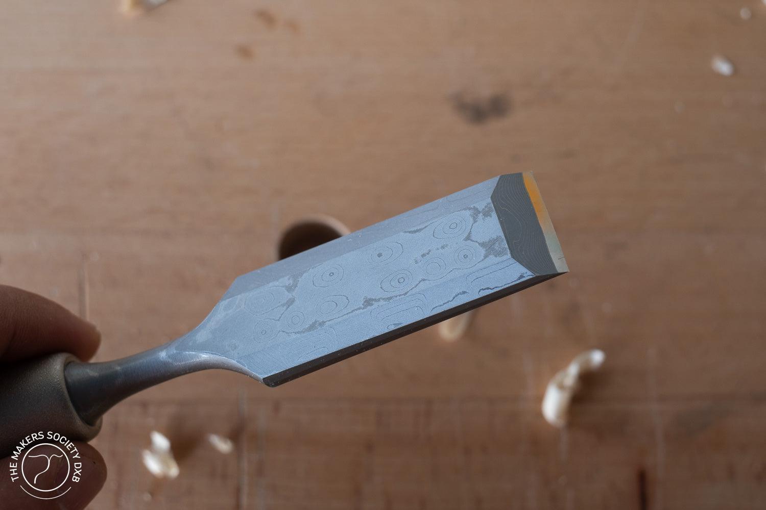Kakuri Highest-Grade Damascus Chisel full top view with detail on the damascus steel sold by The Maker Society Dubai