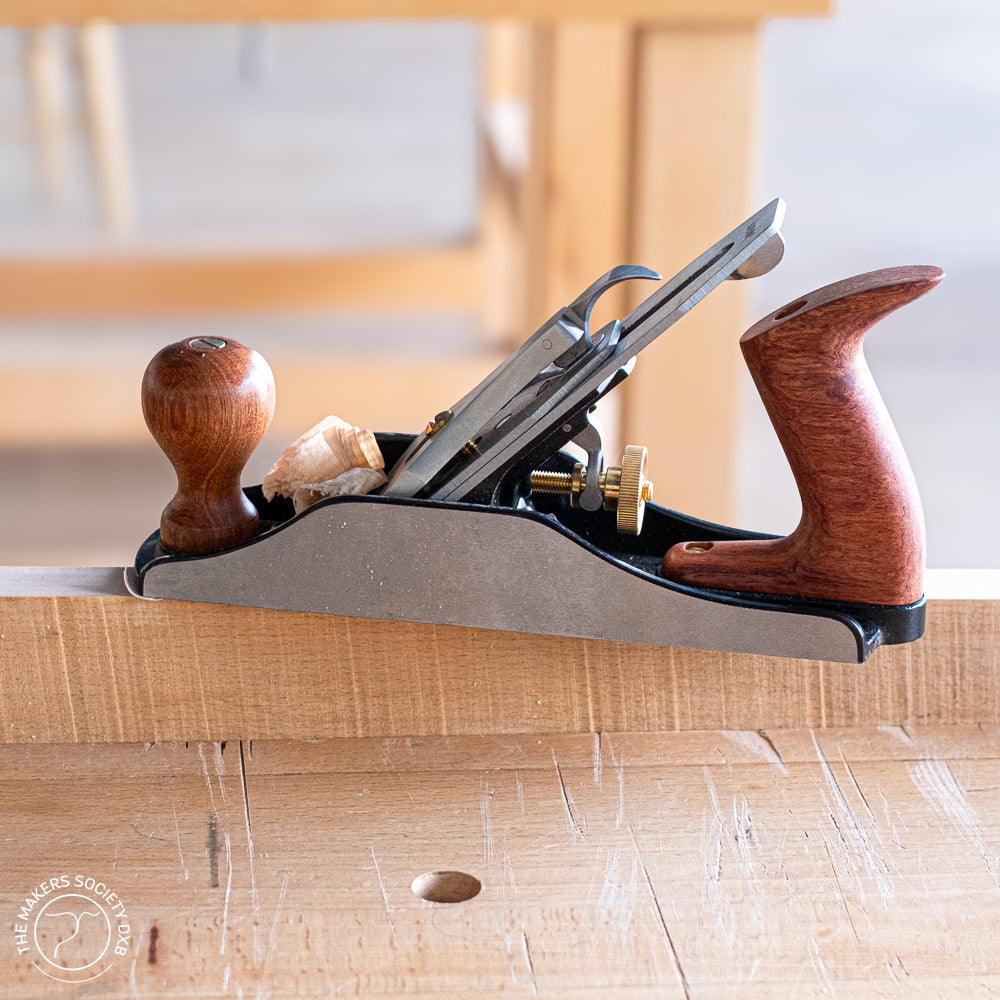 Luban #4 Bench Plane Smoothing Plane sitting on a piece of wood sold by The Makers Society Dubai