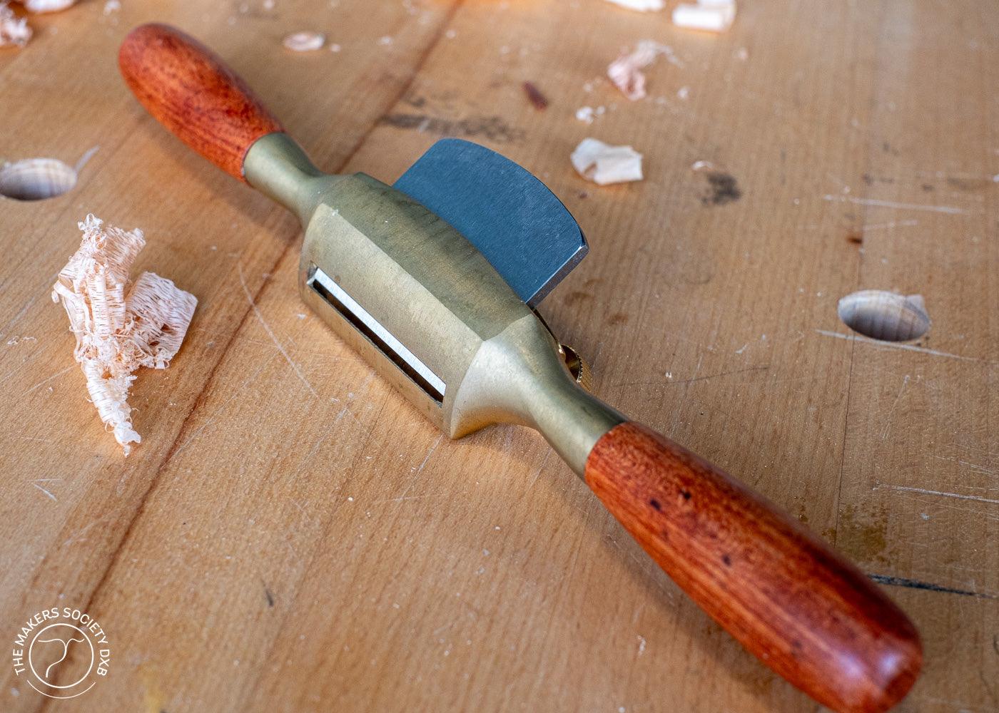 Luban Bronze Spokeshave with curved sole bottom view sold by The Makers Society Dubai