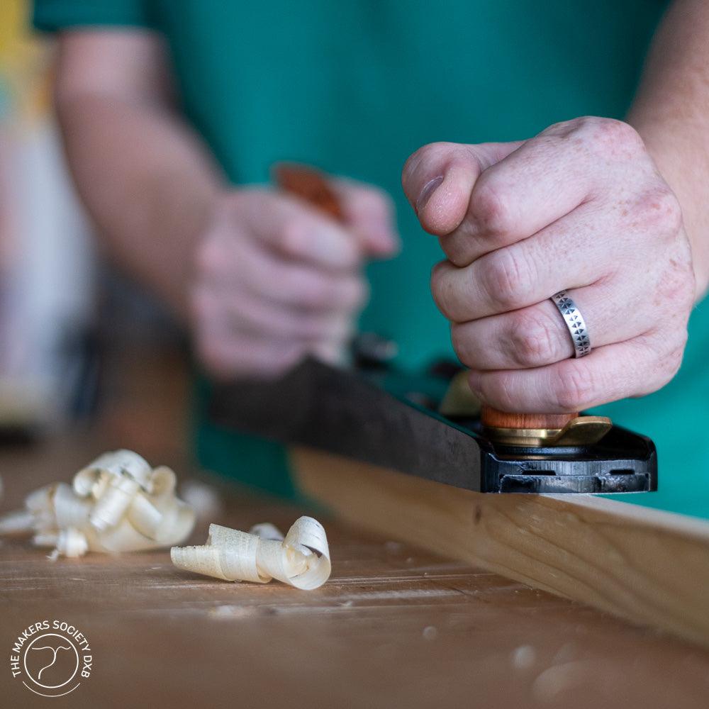 Luban #5 Low Angle Jack Plane in action front view while shaving wood sold by The Makers Society Dubai