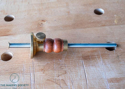 Angled view of the Luban marking gauge highlighting its ergonomic rosewood handle