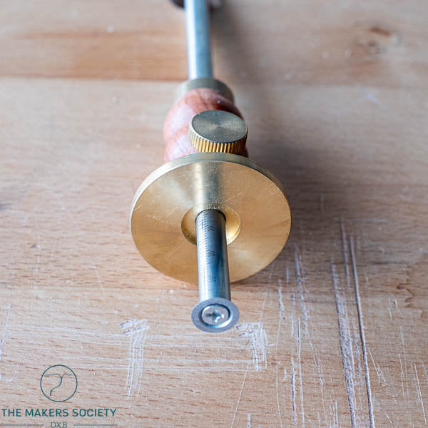 Close-up front view of the Luban marking gauge showing the blade and precision scale