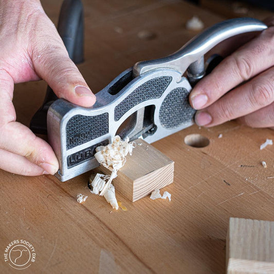 Luban No. 2 Shoulder Plane in action whil trimming a joint on a piece of wood, sold by The Makers Society Dubai