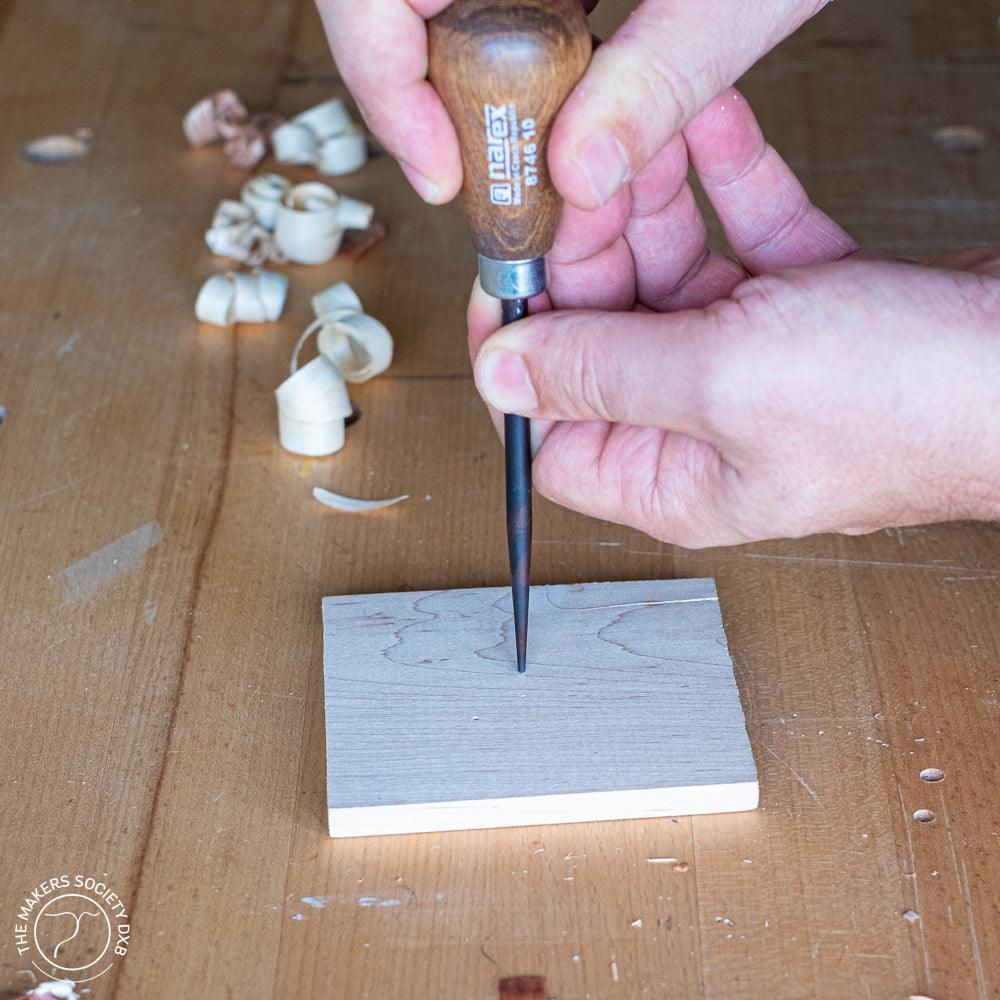 Narex Conical Awl 6 x 164 mm in action ideal for marking holes in wood sold by The Maker Society Dubai