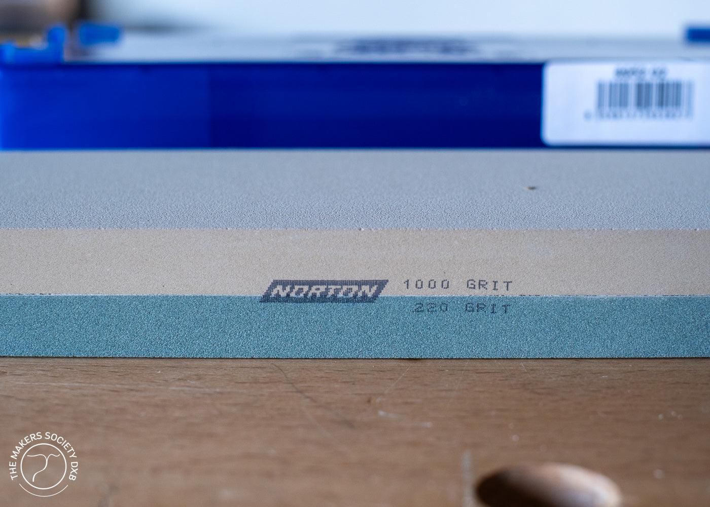 Water stone Norton with combination of grit 220 and 1000 ideal for sharpening hand tools and knives sold at The Makers Society Dubai