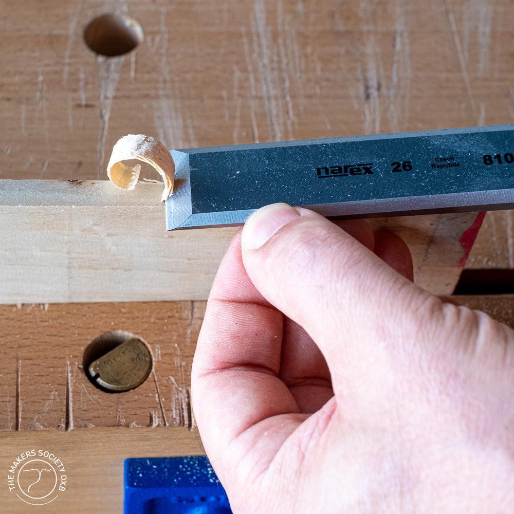 Narex chisel Profi Line during it's use on a woodworking bench sold by The Makers Society Dubai