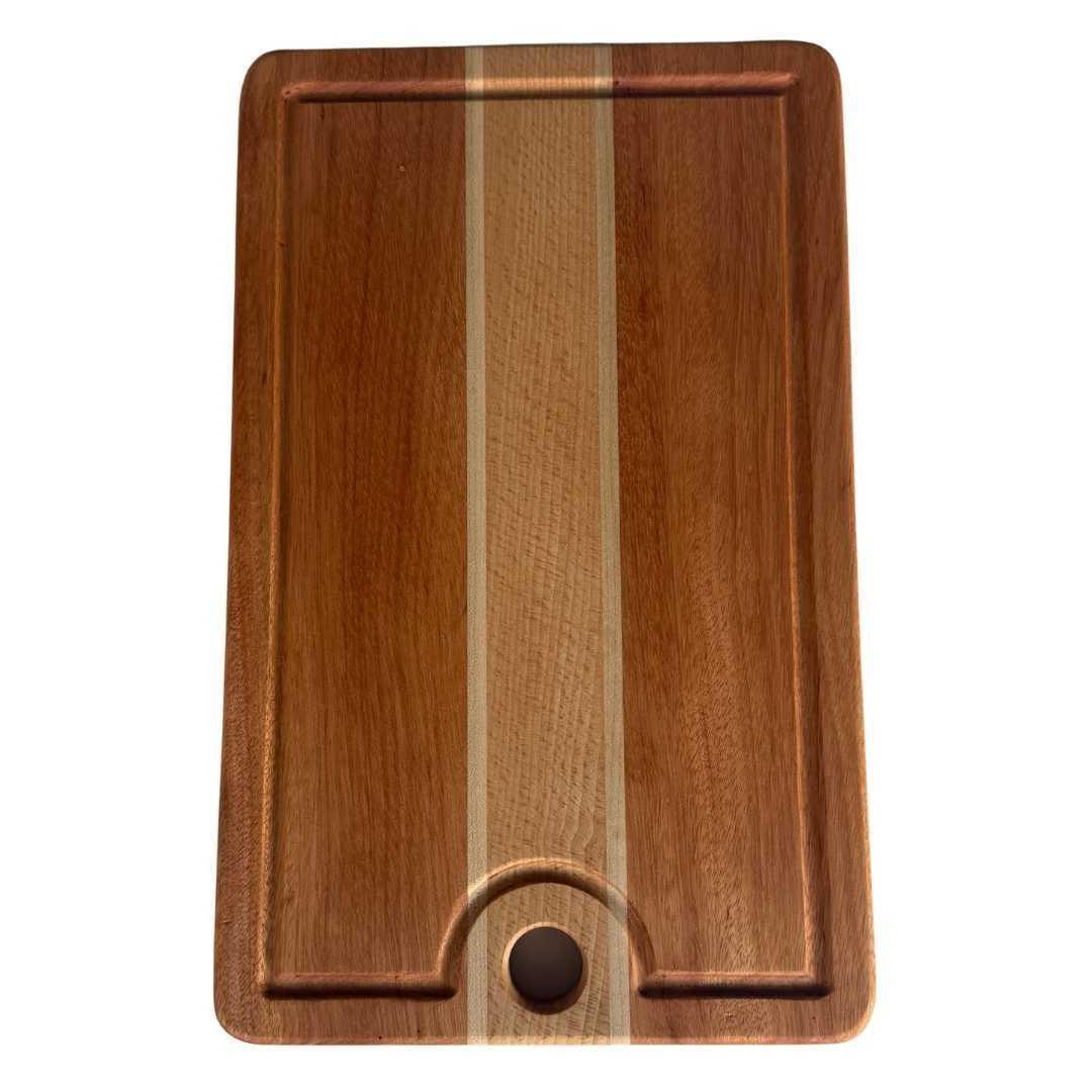 Rectangular wooden serving board with maple, cherry, and ash wood stripes and juice groove