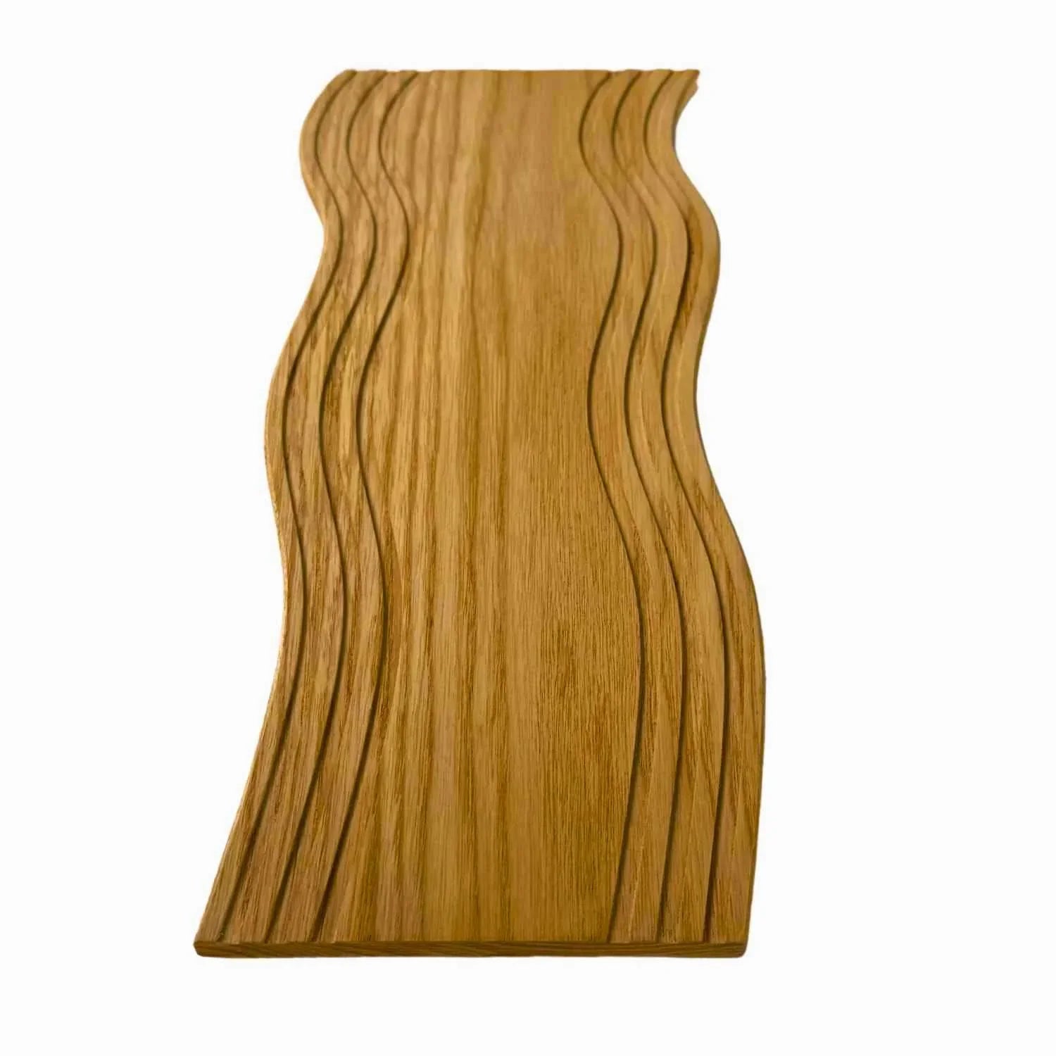 Wave-shaped wooden serving board with carved curved grooves and natural wood grain